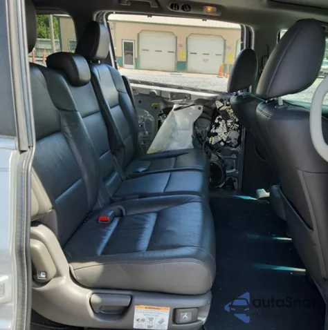 2012 Honda Odyssey Exl z USA, uszkodzony, nr VIN 5FNRL5H65CB101187